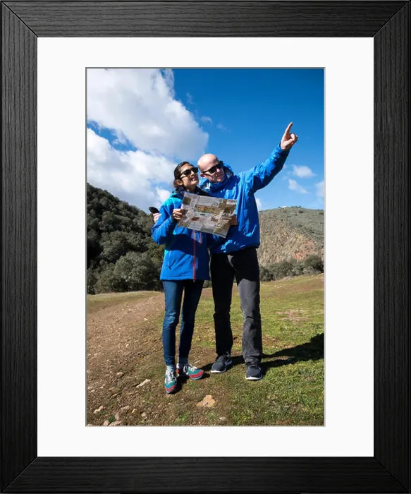Framed Print : Young couple hiking in rural landscape Framed Print : Young couple hiking in rural landscape