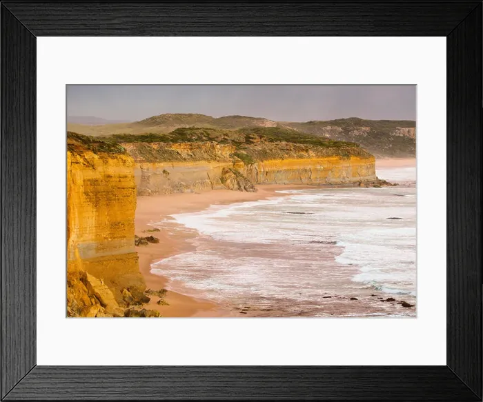 Framed Print : Rugged sandstone cliffs and rough waves near Port Campbell, Great Ocean Road, Victoria, Australia Framed Print : Rugged sandstone cliffs and rough waves near Port Campbell, Great Ocean Road, Victoria, Australia