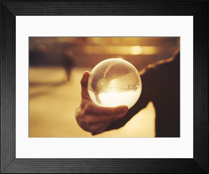Framed Print : Contact juggling. Man balancing glass bowl on hand Framed Print : Contact juggling. Man balancing glass bowl on hand