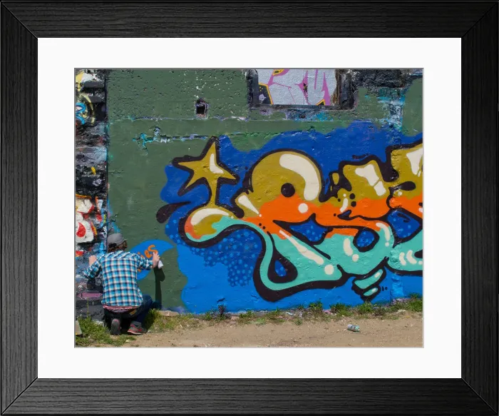 Framed Print : Graffiti artist at work on a wall in Brighton Framed Print : Graffiti artist at work on a wall in Brighton