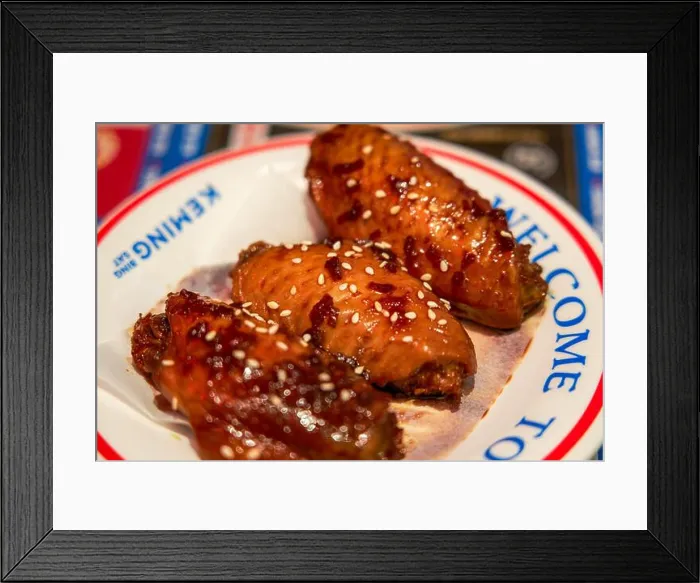 Framed Print : Delicious roasted chicken wings with Swiss sauce in a Hong Kong tea restaurant Framed Print : Delicious roasted chicken wings with Swiss sauce in a Hong Kong tea restaurant
