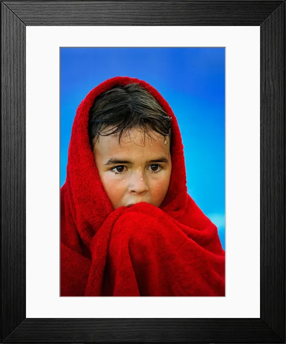 Framed Print : People 8 year old child wrapped in red towel after swimming Model released South Africa Framed Print : People 8 year old child wrapped in red towel after swimming Model released South Africa