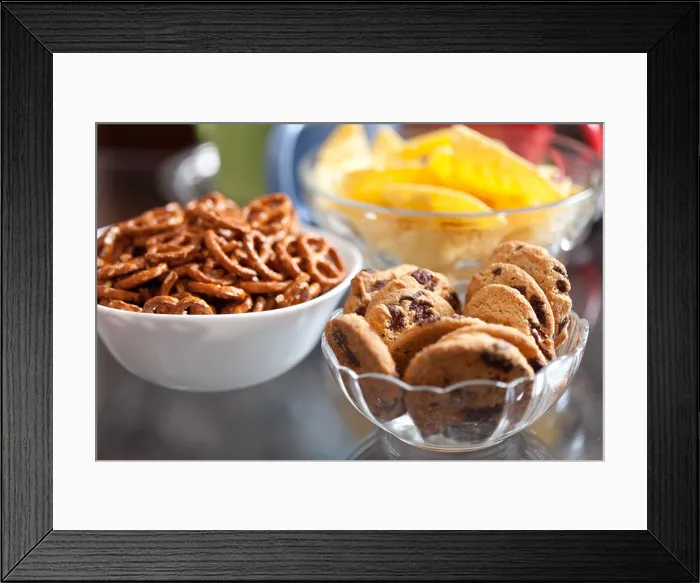 Framed Print : Closeup of delicious cookies and pretzels in bowls, with shallow DOF Framed Print : Closeup of delicious cookies and pretzels in bowls, with shallow DOF