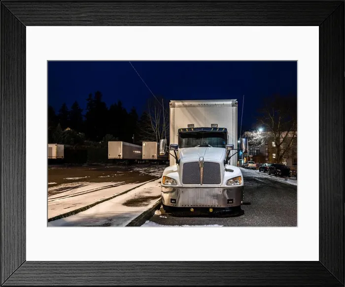 Framed Print : Industrial grade white middle duty compact bonnet rig day cab semi truck with box trailer for local deliveries standing Framed Print : Industrial grade white middle duty compact bonnet rig day cab semi truck with box trailer for local deliveries standing