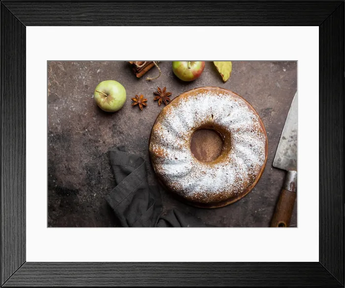 Framed Print : Rustic Style Apple Bundt Cake Sprinkled with Icing Sugar on old wooden table, top view Framed Print : Rustic Style Apple Bundt Cake Sprinkled with Icing Sugar on old wooden table, top view
