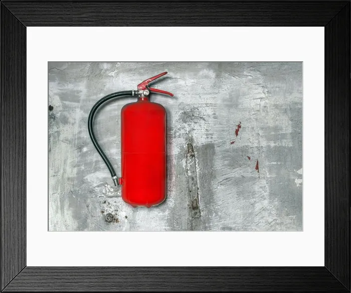 Framed Print : Red fire extinguisher on concrete wall closeup Framed Print : Red fire extinguisher on concrete wall closeup