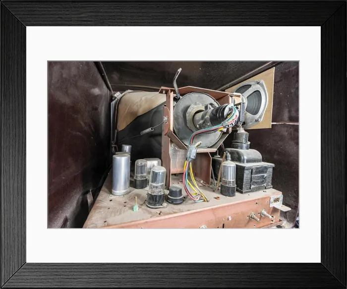 Framed Print : View inside dusty vintage 1950s vacuum tube television set Framed Print : View inside dusty vintage 1950s vacuum tube television set