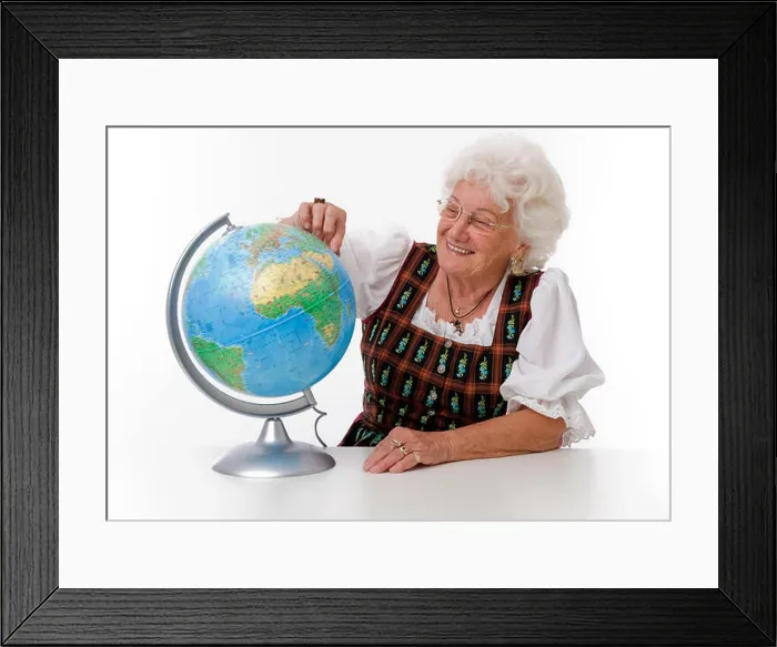 Framed Print : Elderly woman with a globe Framed Print : Elderly woman with a globe