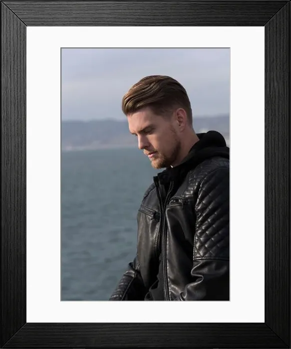 Framed Print : Portrait of a thoughtful young man by the Pacific Ocean Framed Print : Portrait of a thoughtful young man by the Pacific Ocean