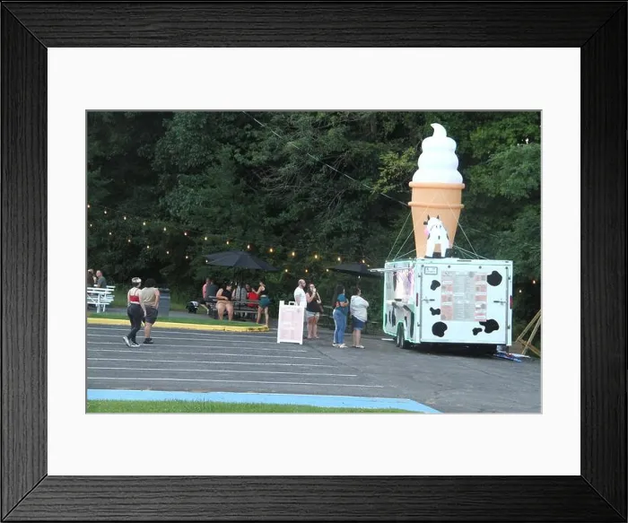 Framed Print : People waiting in line in front of an ice cream truck in the U.S.A Framed Print : People waiting in line in front of an ice cream truck in the U.S.A