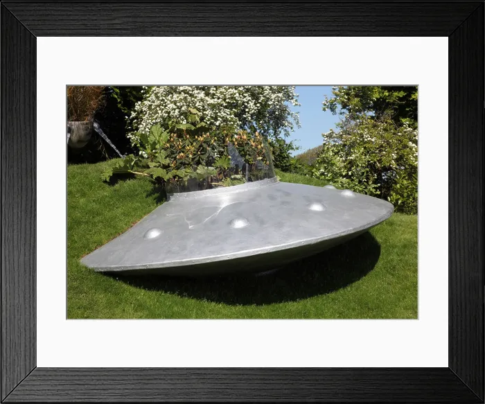 Framed Print : Flying saucer garden feature Framed Print : Flying saucer garden feature