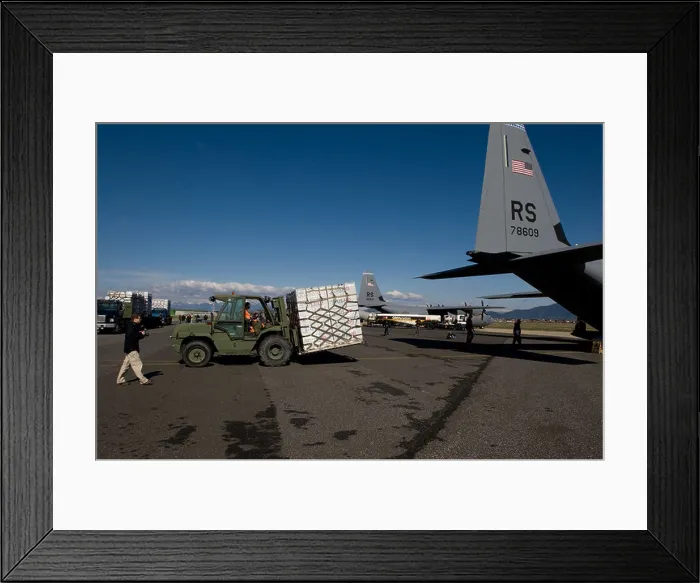Framed Print : U.S. Airmen Load Blankets, Tarps, and Water Containers Onto Aircraft Framed Print : U.S. Airmen Load Blankets, Tarps, and Water Containers Onto Aircraft