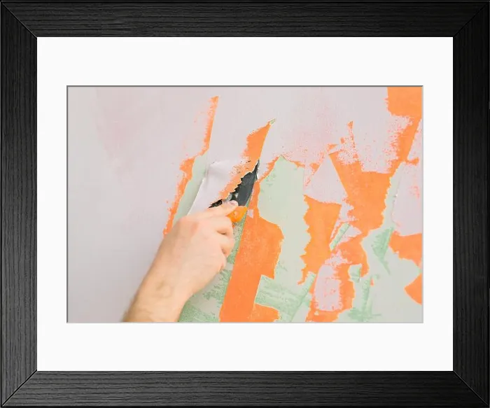Framed Print : Close up man smoothes wall surface with a wall grinder Framed Print : Close up man smoothes wall surface with a wall grinder