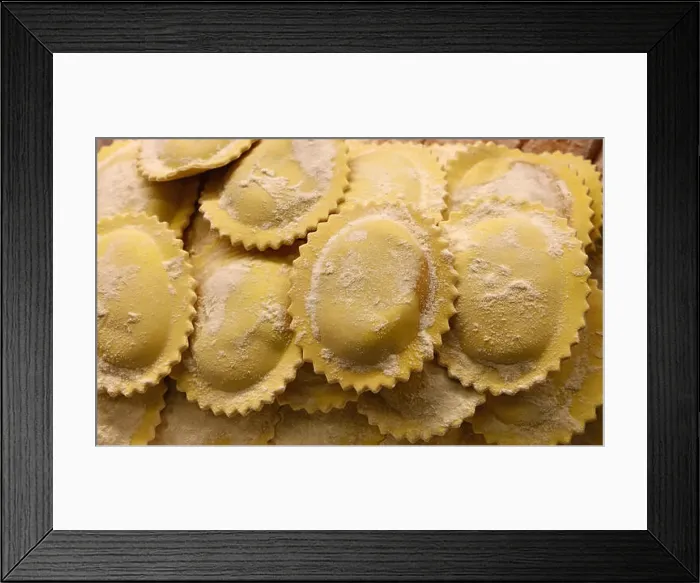 Framed Print : Fresh traditional homemade rustic artisan gourmet Italian ravioli stuffed pasta in retail display Framed Print : Fresh traditional homemade rustic artisan gourmet Italian ravioli stuffed pasta in retail display
