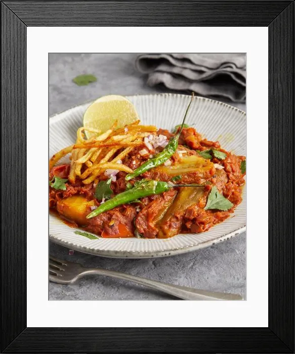 Framed Print : Rogan josh with eggplant on a plate – a spicy vegan curry inspired by Indian cuisine Framed Print : Rogan josh with eggplant on a plate – a spicy vegan curry inspired by Indian cuisine