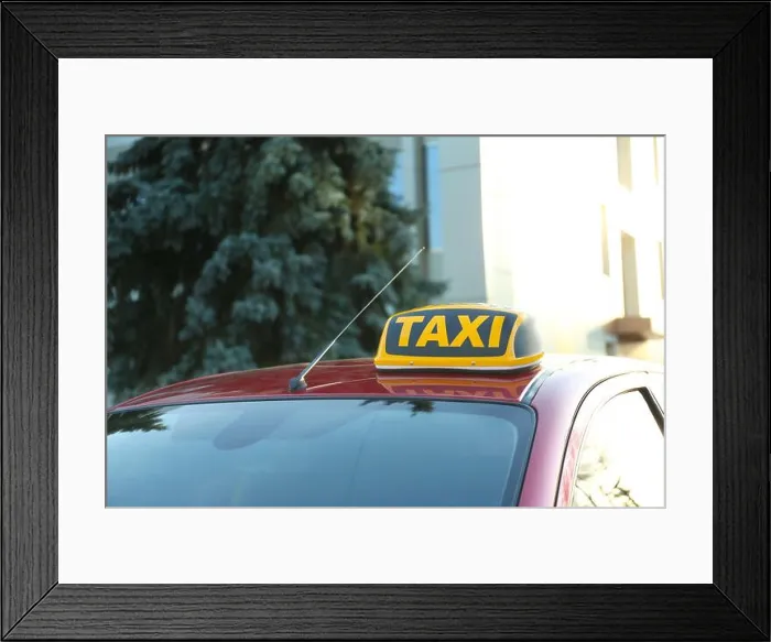 Framed Print : Roof light with word TAXI on car outdoors Framed Print : Roof light with word TAXI on car outdoors