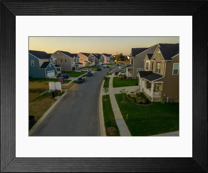 Framed Print : Aerial view of typical American new construction neighborhood street in Maryland for the upper middle class Framed Print : Aerial view of typical American new construction neighborhood street in Maryland for the upper middle class