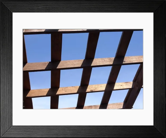Framed Print : Top of a brown wooden gazebo on a sunny summer day bottom up view outdoors Framed Print : Top of a brown wooden gazebo on a sunny summer day bottom up view outdoors
