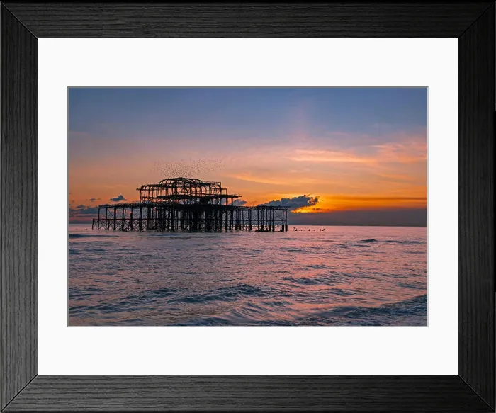 Framed Print : Murmuration over the ruins of Brighton's West Pier on the south coast of England Framed Print : Murmuration over the ruins of Brighton's West Pier on the south coast of England