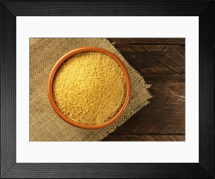 Framed Print : A bowl of raw couscous, shot from above on dark rustic textures with a place for text Framed Print : A bowl of raw couscous, shot from above on dark rustic textures with a place for text