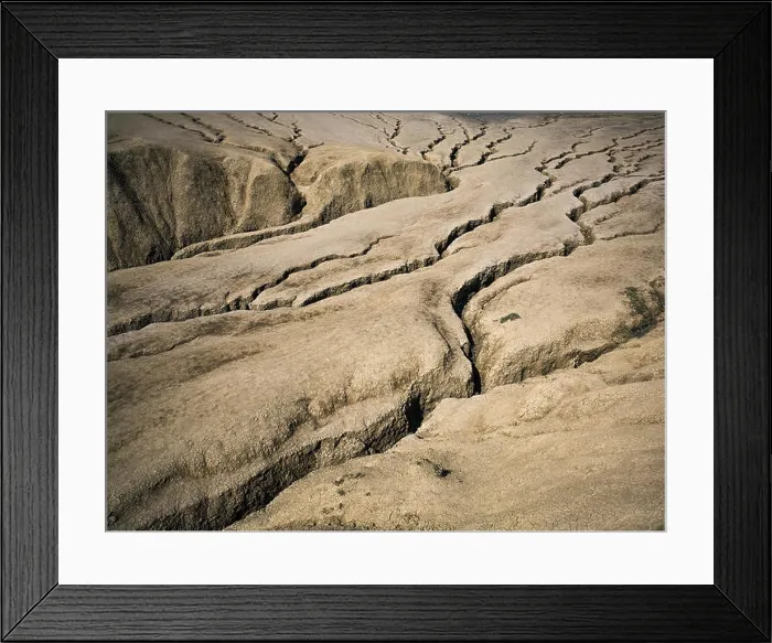 Framed Print : Cracked earth shaped by mud volcanoes Framed Print : Cracked earth shaped by mud volcanoes