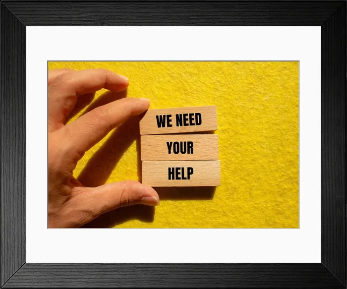 Framed Print : We need your help message written on wooden blocks with yellow background. Conceptual we need your help symbol Framed Print : We need your help message written on wooden blocks with yellow background. Conceptual we need your help symbol