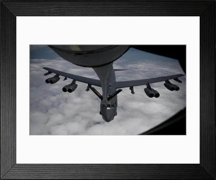 Framed Print : A U.S. B-52H Stratofortress aircraft assigned to the 20th Expeditionary Bomb Squadron refuels from a KC-135 Framed Print : A U.S. B-52H Stratofortress aircraft assigned to the 20th Expeditionary Bomb Squadron refuels from a KC-135