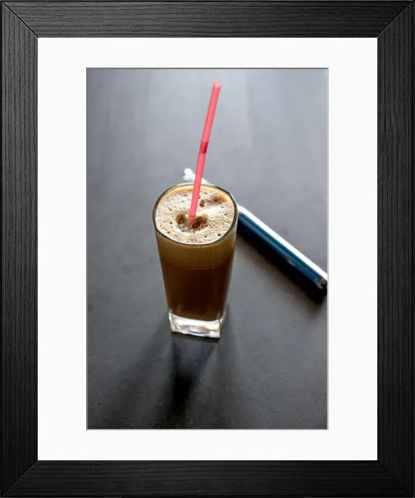 Framed Print : Greek coffee and electronic cigarette on table. Natural light Framed Print : Greek coffee and electronic cigarette on table. Natural light