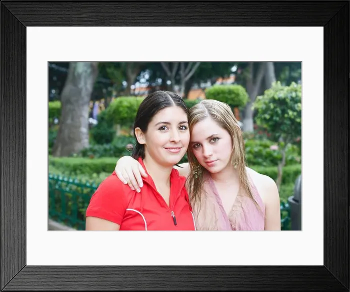Framed Print : Portrait of two young women smiling Framed Print : Portrait of two young women smiling