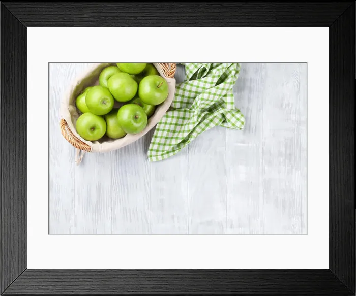 Framed Print : Green apples in basket over wooden table. Top view with copy space Framed Print : Green apples in basket over wooden table. Top view with copy space