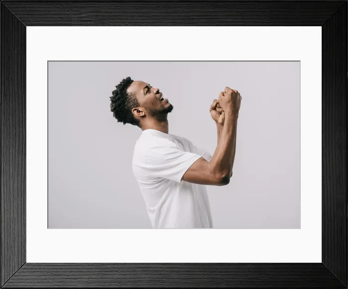 Framed Print : upset bearded african american man with clenched fists isolated on grey Framed Print : upset bearded african american man with clenched fists isolated on grey