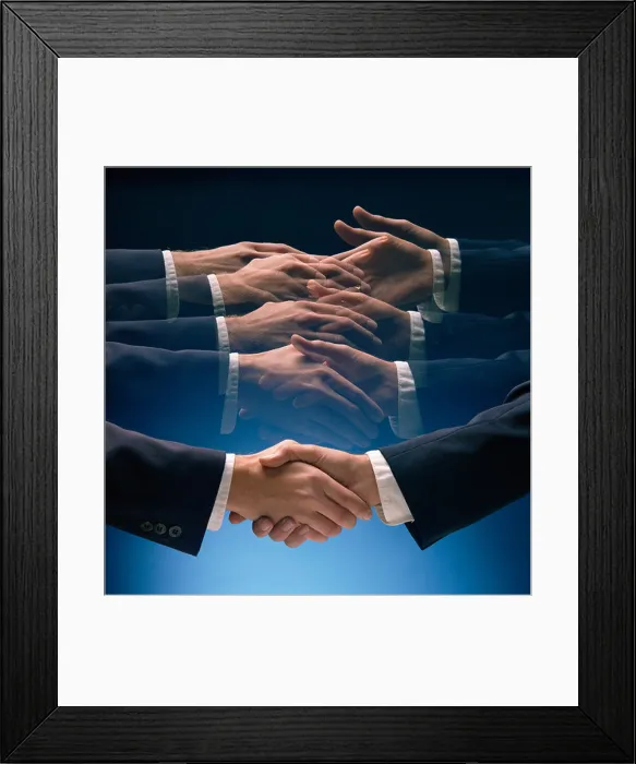 Framed Print : Close-up of two men's hands clasped in handshake