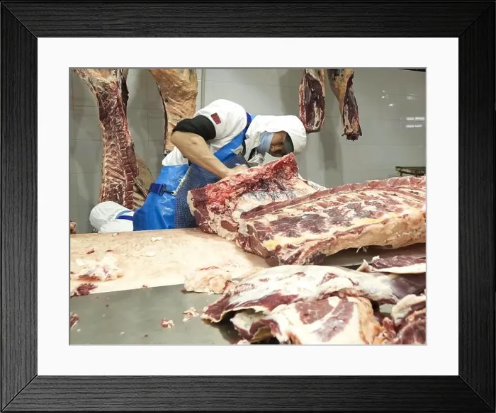 Framed Print : Astana, Kazakhstan - June 24, 2021 - Beef and pork carcass cutting shop. Meat department. meat processing factory Framed Print : Astana, Kazakhstan - June 24, 2021 - Beef and pork carcass cutting shop. Meat department. meat processing factory