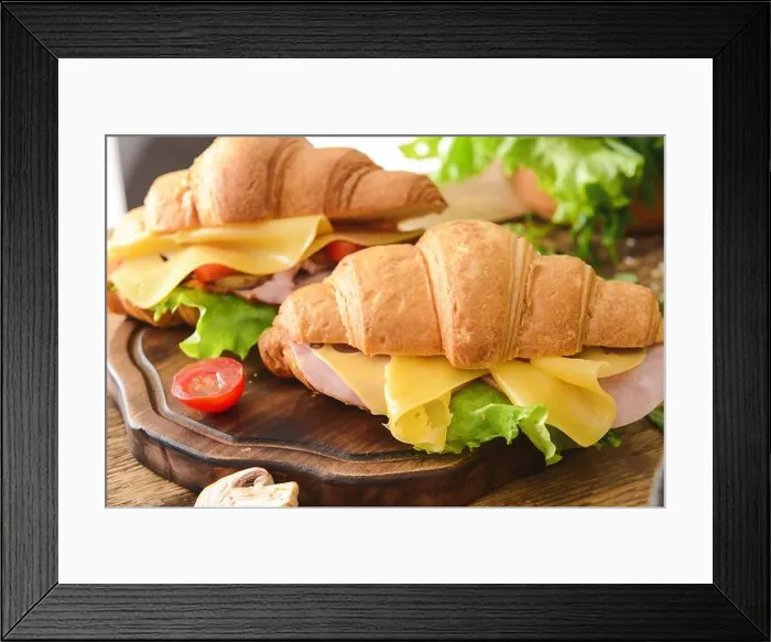 Framed Print : Tasty croissant sandwiches on wooden board Framed Print : Tasty croissant sandwiches on wooden board