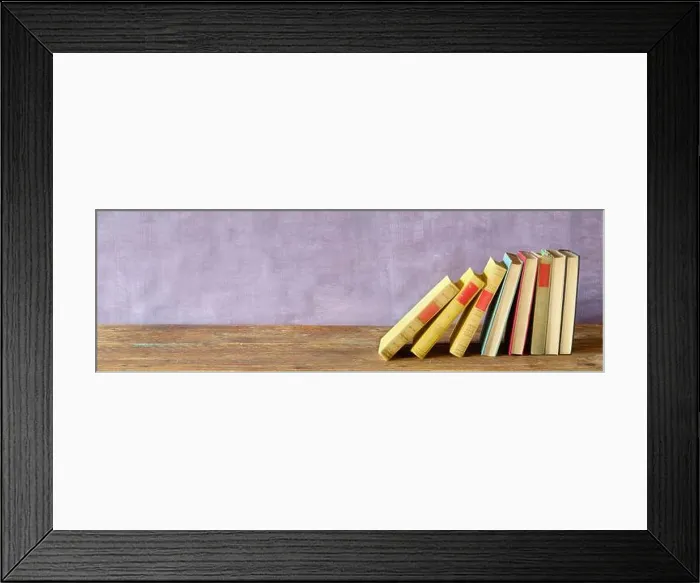 Framed Print : row of book, panoramic, large copy space, reading, education, home office, back to school concept Framed Print : row of book, panoramic, large copy space, reading, education, home office, back to school concept