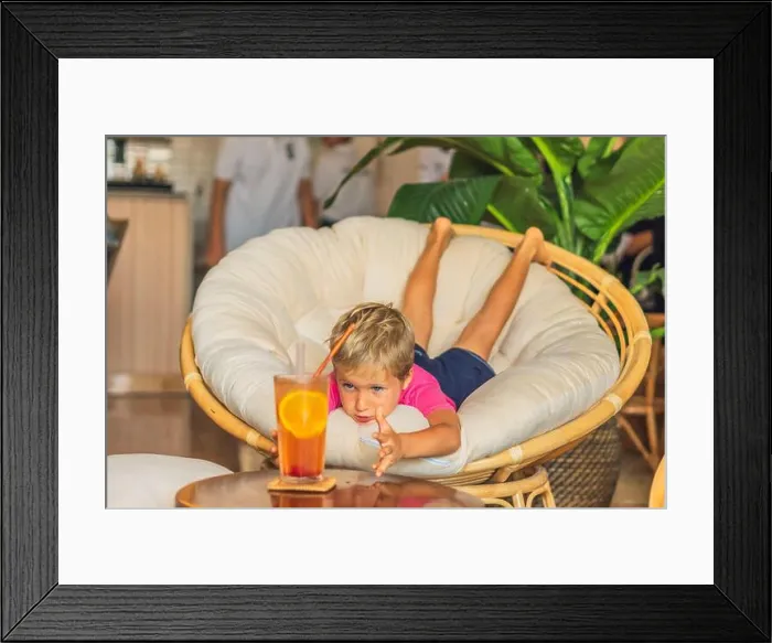 Framed Print : Thirsty curious caucasian blond boy want to taste lemonade Framed Print : Thirsty curious caucasian blond boy want to taste lemonade