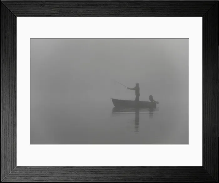 Framed Print : Fishing early morning in a row boat on a foggy lake Framed Print : Fishing early morning in a row boat on a foggy lake