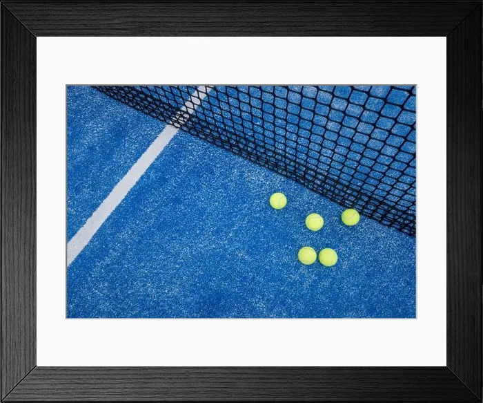 Framed Print : five paddle tennis ball on the net of a blue paddle tennis court Framed Print : five paddle tennis ball on the net of a blue paddle tennis court