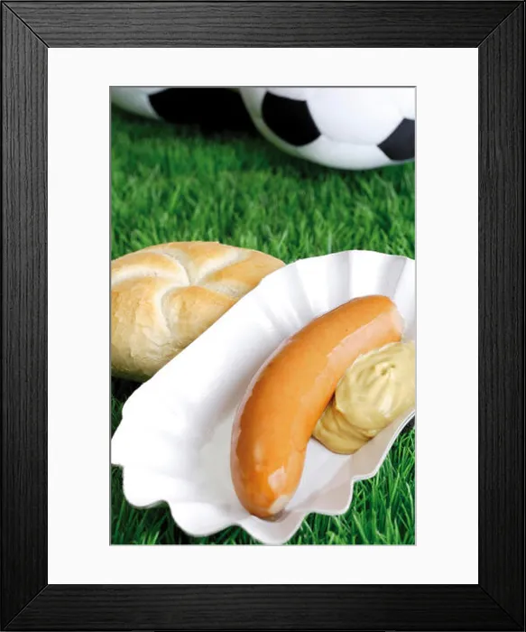 Framed Print : Bockwurst sausage with mustard and bread roll on a football turf Framed Print : Bockwurst sausage with mustard and bread roll on a football turf