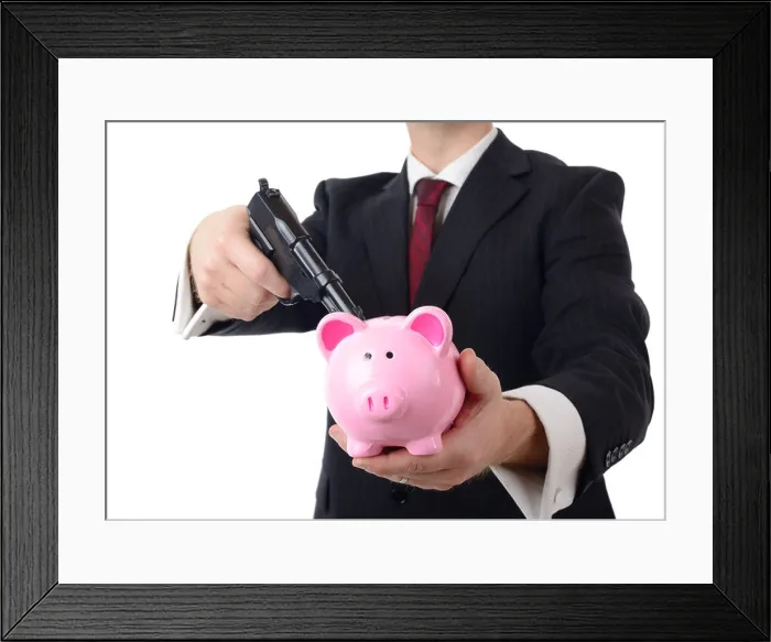 Framed Print : businessman holding bank to ransom with a gun isolated on a white background Framed Print : businessman holding bank to ransom with a gun isolated on a white background