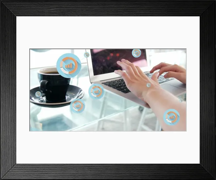 Framed Print : Image of multiple graph icon in circles over coffee cup and caucasian woman working on laptop Framed Print : Image of multiple graph icon in circles over coffee cup and caucasian woman working on laptop