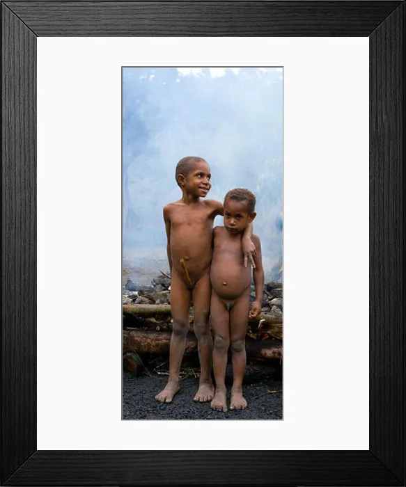 Framed Print : DANI VILLAGE, WAMENA, IRIAN JAYA, NEW GUINEA, INDONESIA – 25 JULY 2009: Children in the village of Dani tribe Framed Print : DANI VILLAGE, WAMENA, IRIAN JAYA, NEW GUINEA, INDONESIA – 25 JULY 2009: Children in the village of Dani tribe