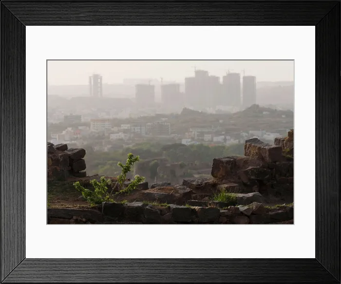 Framed Print : A view from the Golconda Fort of large residential complexes under construction in Hyderabad in India