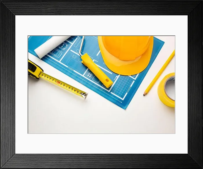 Framed Print : Floor plan, hard hat, tape measure, construction tools on a white background Framed Print : Floor plan, hard hat, tape measure, construction tools on a white background