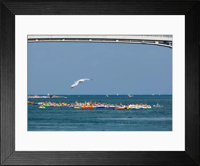 Framed Print : Port Huron, Michigan, USA. Thousands of rafters participated in the annual Port Huron Float Down on the St Framed Print : Port Huron, Michigan, USA. Thousands of rafters participated in the annual Port Huron Float Down on the St
