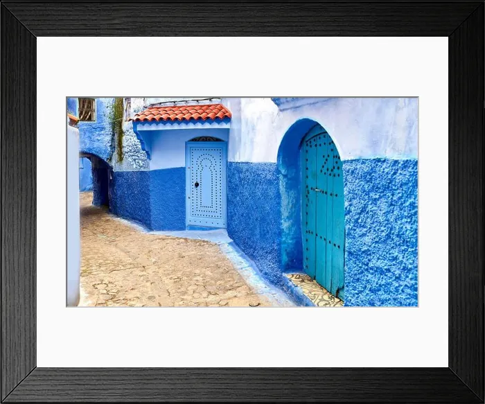 Framed Print : Streets and colored houses, View from the city street where all buildings are painted only in blue Framed Print : Streets and colored houses, View from the city street where all buildings are painted only in blue