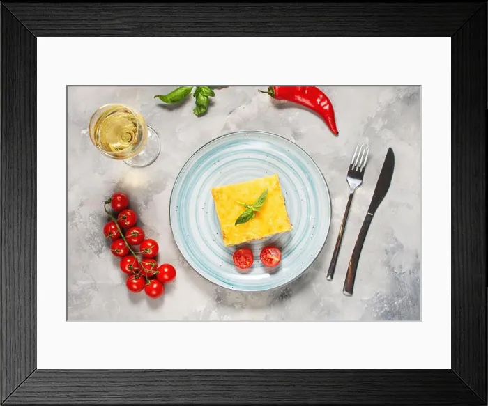 Framed Print : Delicious homemade italian Lasagna with bachamel sauce and glasses of wine on concrete background. top view Framed Print : Delicious homemade italian Lasagna with bachamel sauce and glasses of wine on concrete background. top view