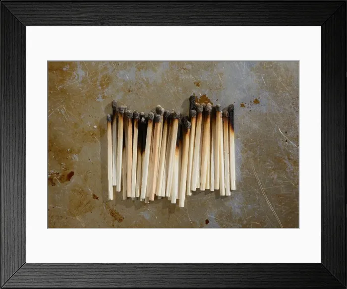Framed Print : Studio shot of row of burned matches Framed Print : Studio shot of row of burned matches