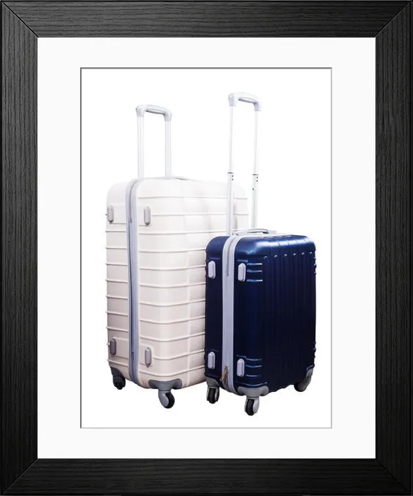 Framed Print : Two suitcases of different size with wheels standing upright Framed Print : Two suitcases of different size with wheels standing upright