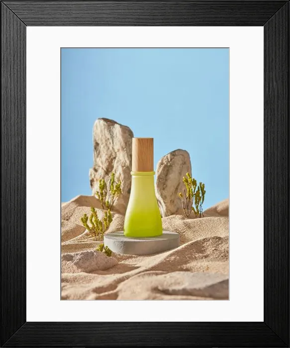 Framed Print : Natural concept with green glass bottle on round podium Framed Print : Natural concept with green glass bottle on round podium